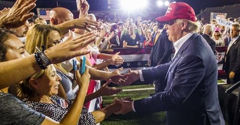 PLAYING THE TRUMP CARD.