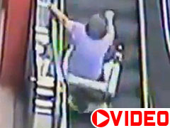 Woman Flips Wheelchair Riding Up Escalator video